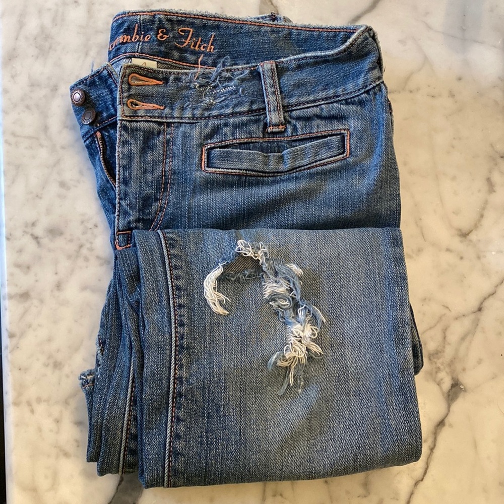 Vintage A&F, Bootcut, Low-rise, Destroyed, Button/Zip, straight pockets.